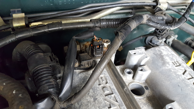 The troublesome valve oiling system, hidden behind a sensor all the way in the back of the engine, about an inch away from the firewall.